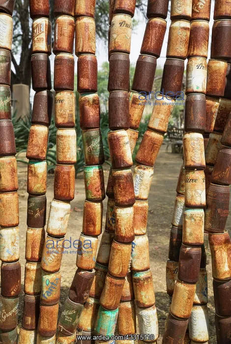 : 80183583 Fence - made of old rusty cans in the garden : 80183583 Fence - made of old rusty cans in the garden