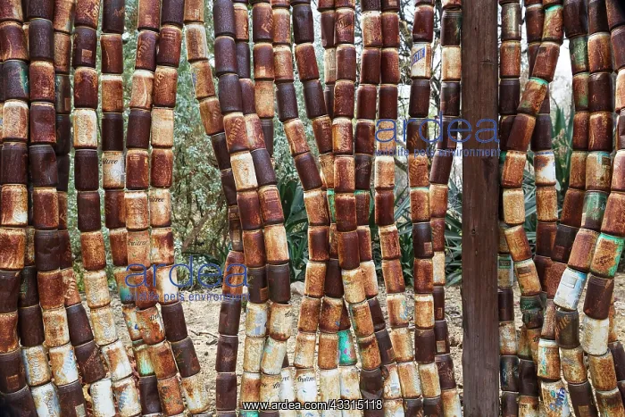  : 80183584 Fence - made of old rusty cans in the garden