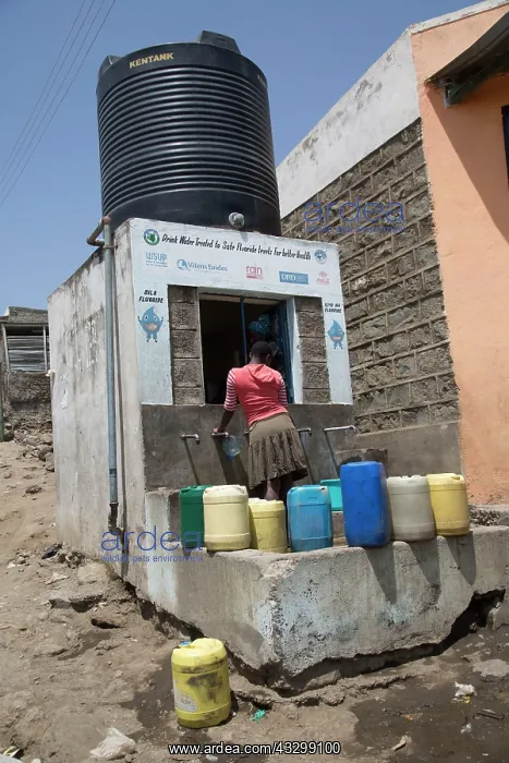 : 80186932 Villagers with containers collecting safe : 80186932 Villagers with containers collecting safe
