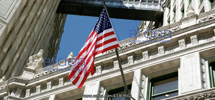 : 80191553 American flag on the Wrigley Building in : 80191553 American flag on the Wrigley Building in