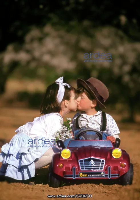 : 80200284 Children - boy wearing hat and girl holding : 80200284 Children - boy wearing hat and girl holding