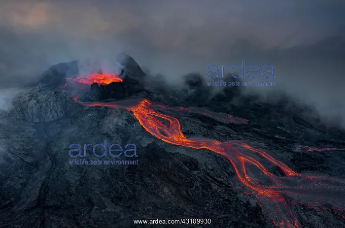 : Aerial view, erupting volcano with lava fountains : Aerial view, erupting volcano with lava fountains
