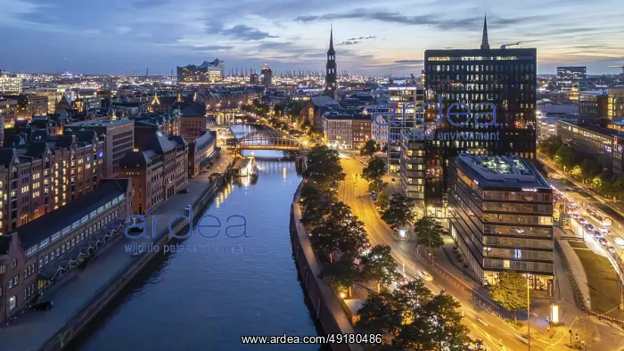 : Aerial view of Hamburg's Speicherstadt warehouse district at blue hour with a view of the Zollkanal : Aerial view of Hamburg's Speicherstadt warehouse district at blue hour with a view of the Zollkanal