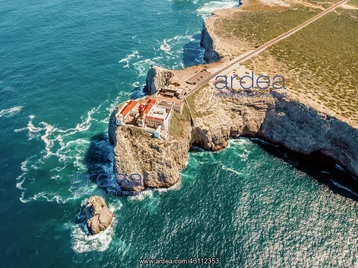 : Aerial view, lighthouse on the cliffs, Saint Vincent : Aerial view, lighthouse on the cliffs, Saint Vincent
