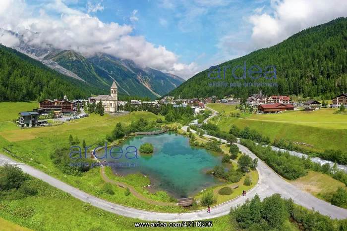 : Aerial view, in front pond, behind parish church : Aerial view, in front pond, behind parish church