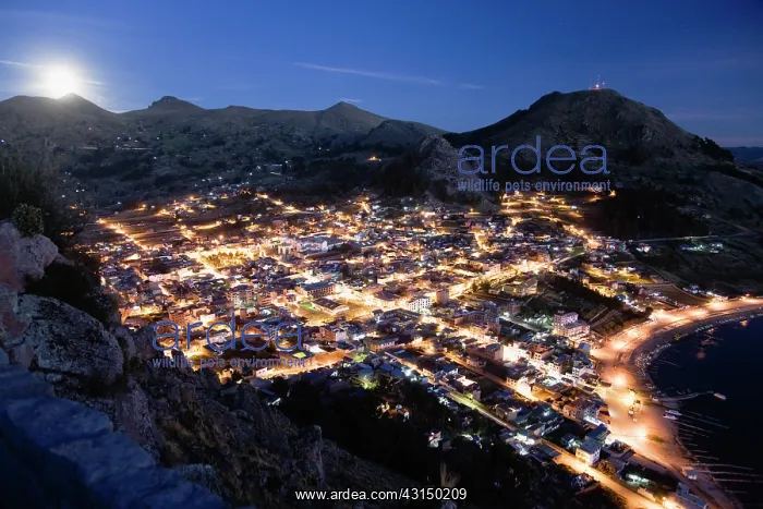 : Aerial view of rising moon on beach of Copacabana : Aerial view of rising moon on beach of Copacabana
