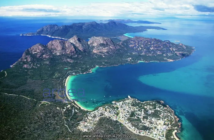 : Aerial view with town of Coles Bay in foreground : Aerial view with town of Coles Bay in foreground