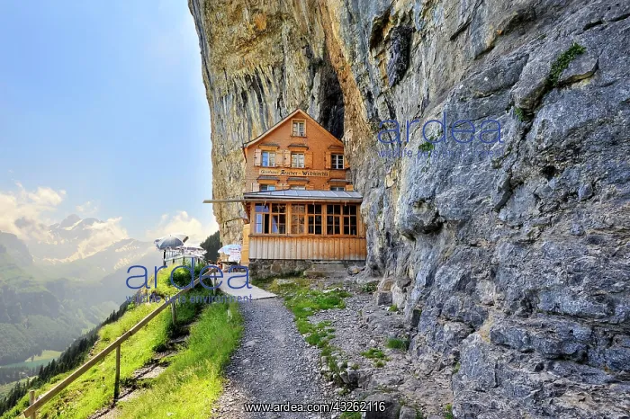 : Aescher Mountain Inn at the Wildkirchli caves below : Aescher Mountain Inn at the Wildkirchli caves below