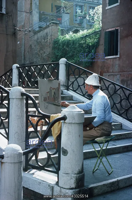 : Artist painting on bridge : Artist painting on bridge