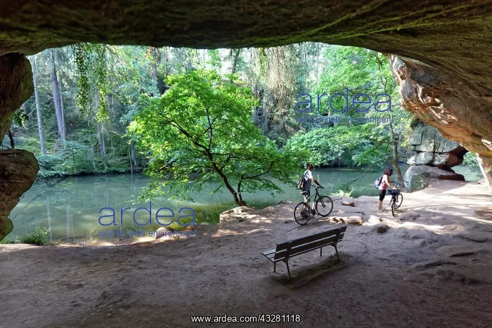 : Bank and cyclist in front of Gutav Adolf cave, geotope : Bank and cyclist in front of Gutav Adolf cave, geotope