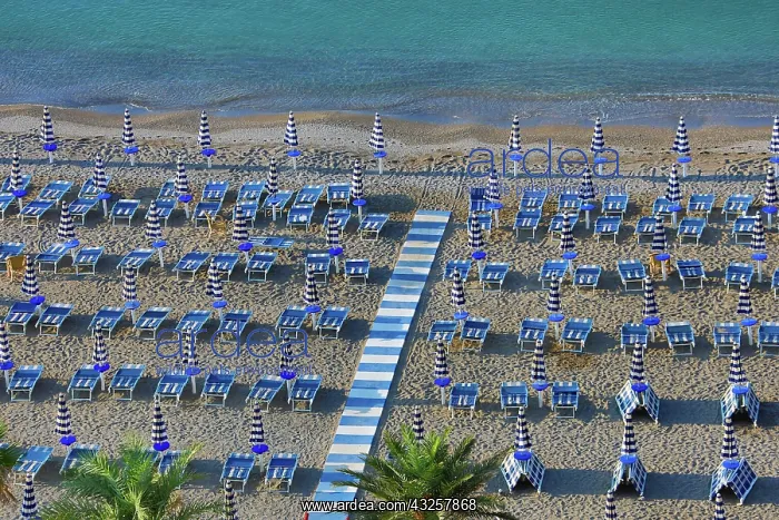  : Beach chairs and umbrellas on the beach at Vietri