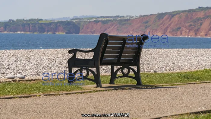 : Bench and pebble beach in Budleigh Salterton, Jurassic : Bench and pebble beach in Budleigh Salterton, Jurassic