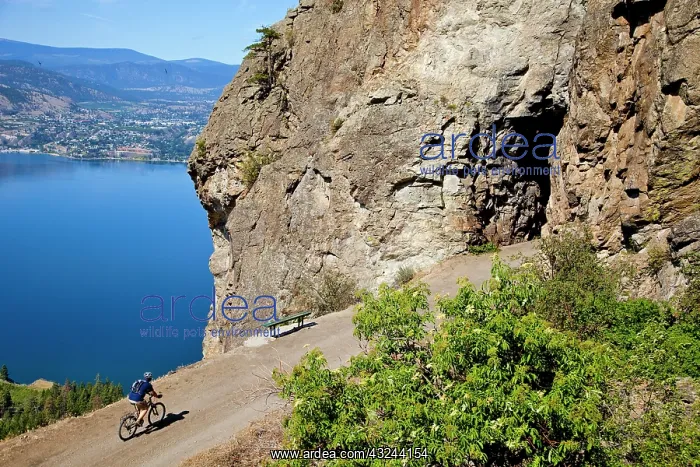 : Biker rides on the Kettle Valley Railway : Biker rides on the Kettle Valley Railway
