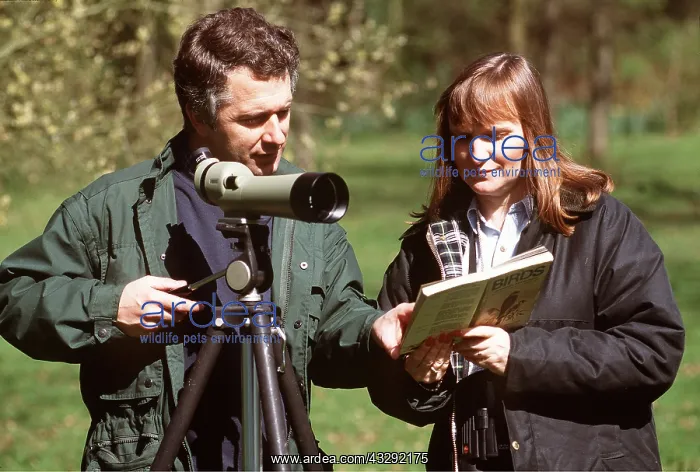 : BIRDWATCHERS - with fieldguide and telescope : BIRDWATCHERS - with fieldguide and telescope