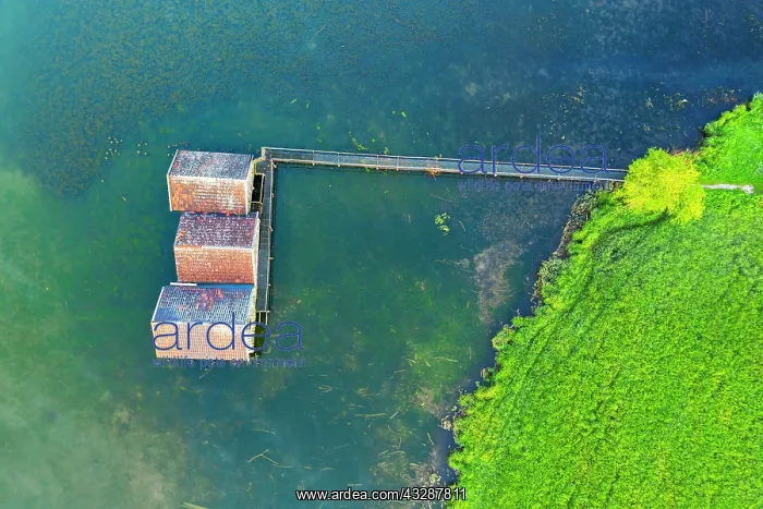 : Boathouses in Lake Kochel near Schlehdorf from above : Boathouses in Lake Kochel near Schlehdorf from above