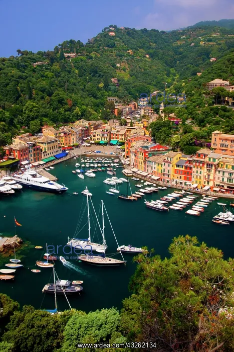 : Boats moored in the tiny harbor town of : Boats moored in the tiny harbor town of
