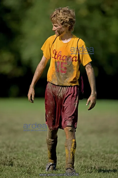 : Boy Age 12 Playing Soccer covered with mud : Boy Age 12 Playing Soccer covered with mud