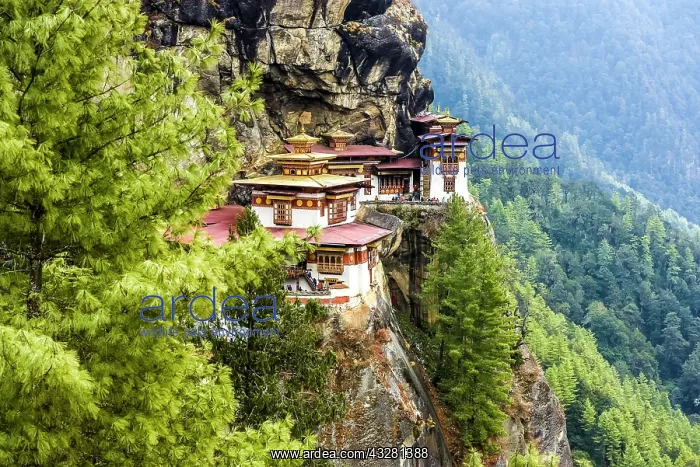 : Buddhist tiger nest monastery Taktshang on steep : Buddhist tiger nest monastery Taktshang on steep