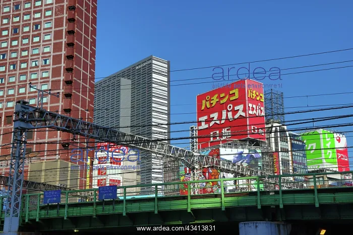 : Buildings along the skyline of Kabukicho and train tracks in : Buildings along the skyline of Kabukicho and train tracks in