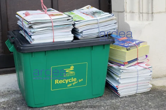 : Bundles of magazines and newspapers neatly tied : Bundles of magazines and newspapers neatly tied