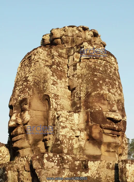  : Cambodia - A Prasat (pyramid tower) with the faces