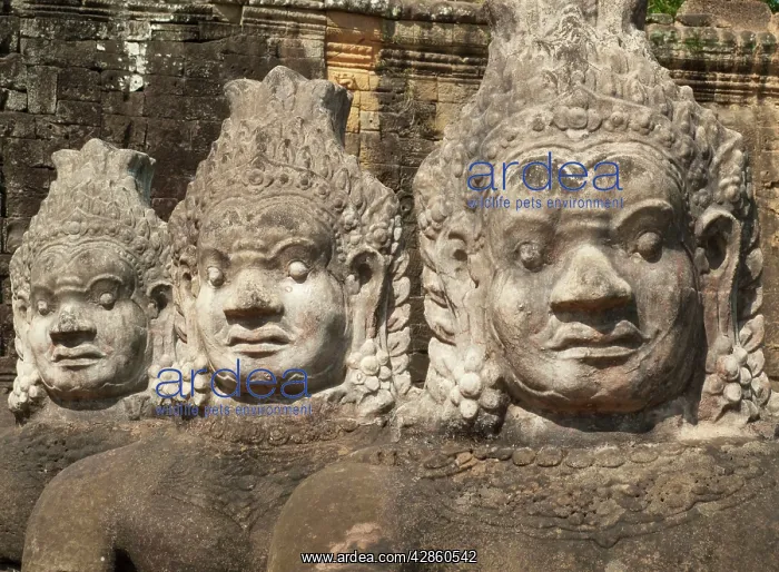: Cambodia - Row of demons along the access road : Cambodia - Row of demons along the access road
