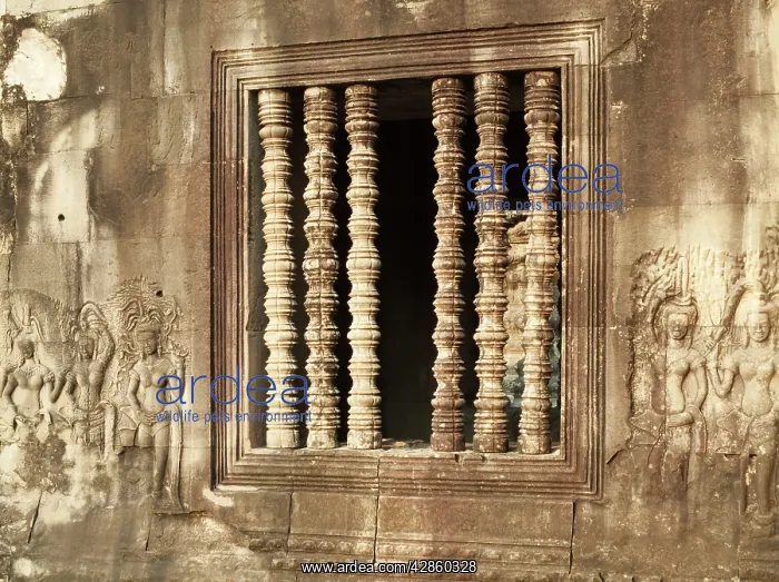 : Cambodia - Window with colonettes and Devatas (deity : Cambodia - Window with colonettes and Devatas (deity