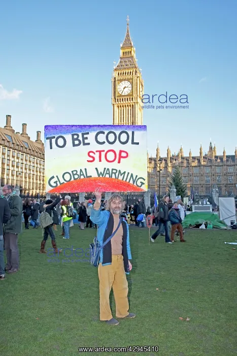  : Campaigner with banner on Climate Change March