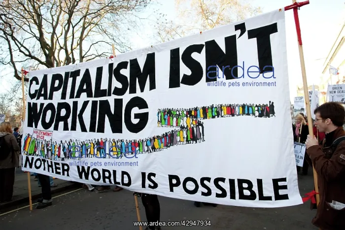 : Campaigners with Capitalism isn't working banner : Campaigners with Capitalism isn't working banner