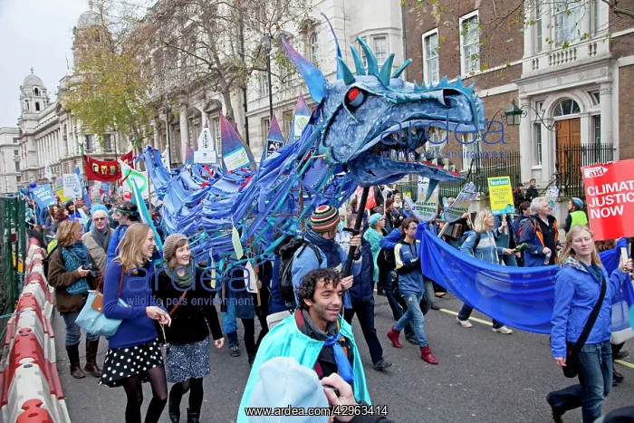 : Campaigners with Welsh dragon on The Wave Climate Change : Campaigners with Welsh dragon on The Wave Climate Change