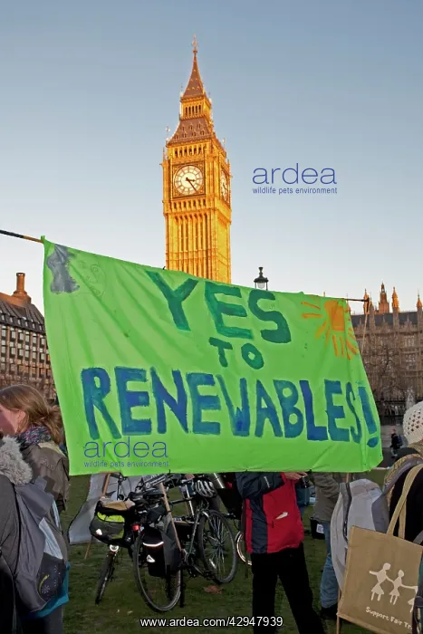 : Campaigners with Yes to renewables banner on Climate Change : Campaigners with Yes to renewables banner on Climate Change