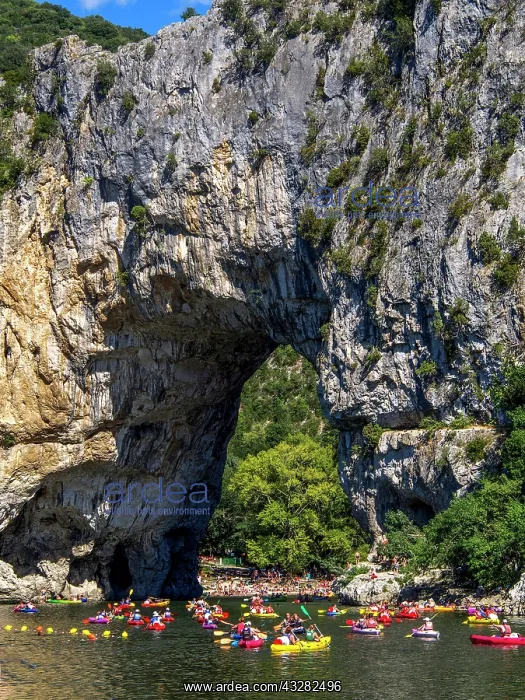 : Canoes with canoeists on the Ardeche river near : Canoes with canoeists on the Ardeche river near