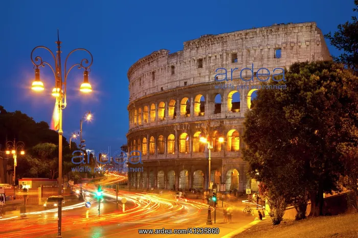 : Car light-trails in front of the Roman Coliseum : Car light-trails in front of the Roman Coliseum