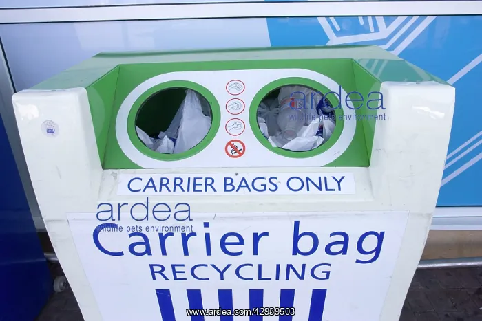 : Carrier bag recycling container outside Tesco food : Carrier bag recycling container outside Tesco food
