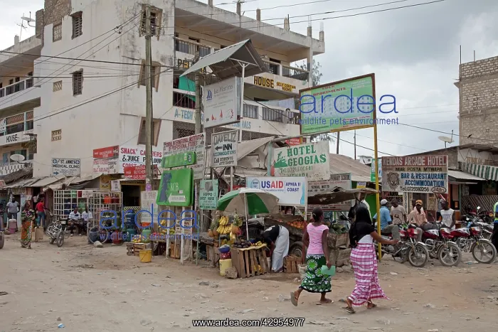 : Casual street scene with market stalls advertising : Casual street scene with market stalls advertising