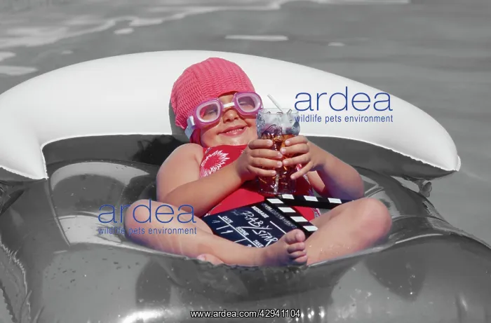 : Child - water baby floating on lilo : Child - water baby floating on lilo