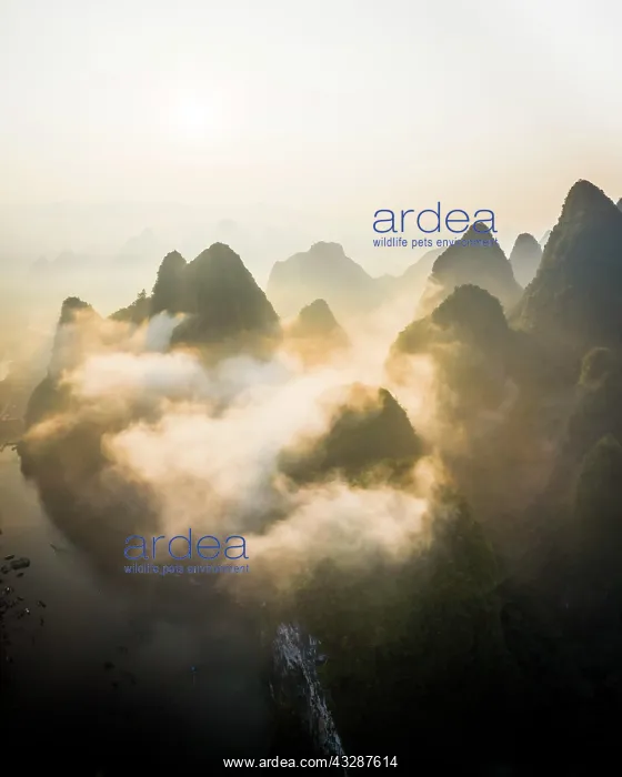 : Chinese karst mountains at the Yangshuo River at : Chinese karst mountains at the Yangshuo River at