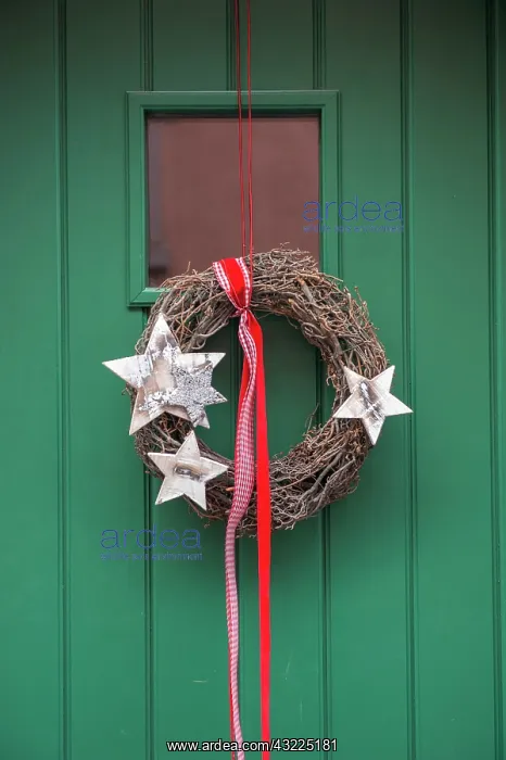 : Christmas decoration, wreath on front door : Christmas decoration, wreath on front door