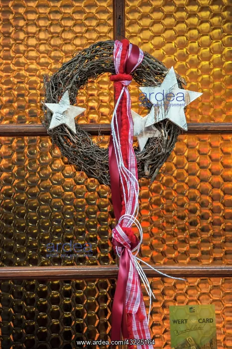 : Christmas decoration, wreath in window : Christmas decoration, wreath in window