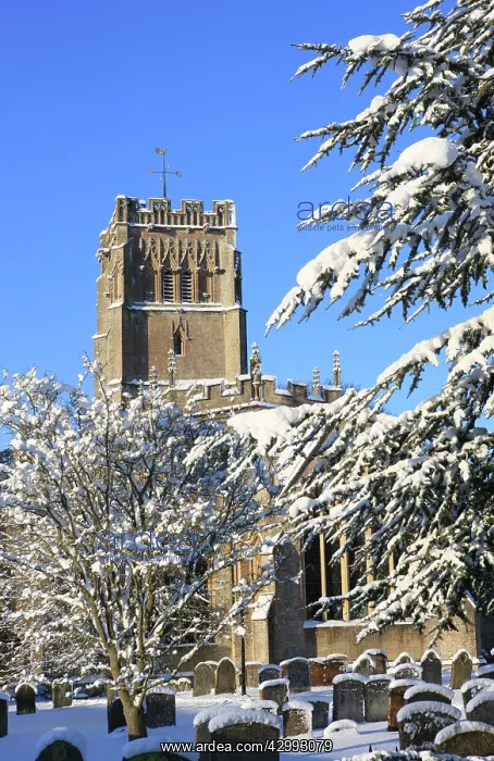: Church - and graveyard in winter snow : Church - and graveyard in winter snow