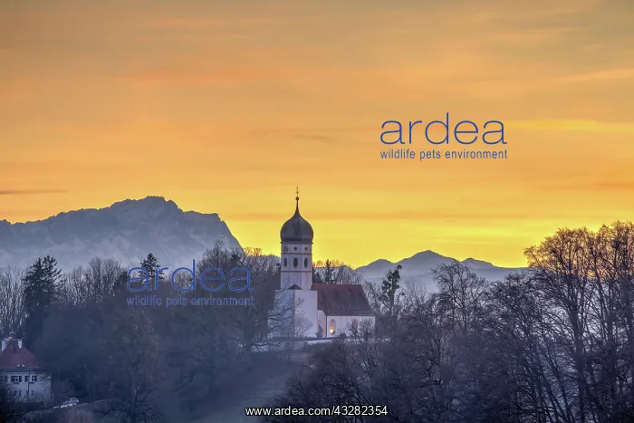  : Church St. Johann Baptist at sunset, in the back