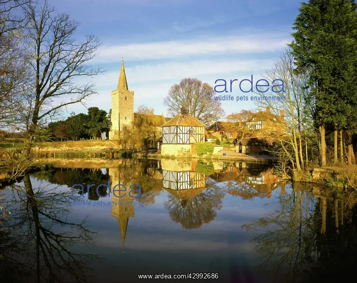 : Church - with timber framed Dovecote reflected : Church - with timber framed Dovecote reflected