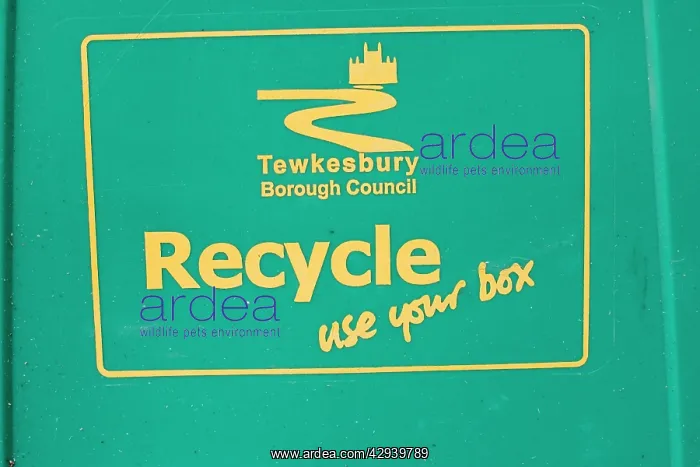 : Close up of green recycle bin Cotswolds UK : Close up of green recycle bin Cotswolds UK