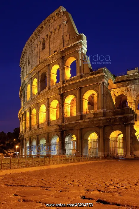 : Cobblestones lead to the Roman Coliseum : Cobblestones lead to the Roman Coliseum