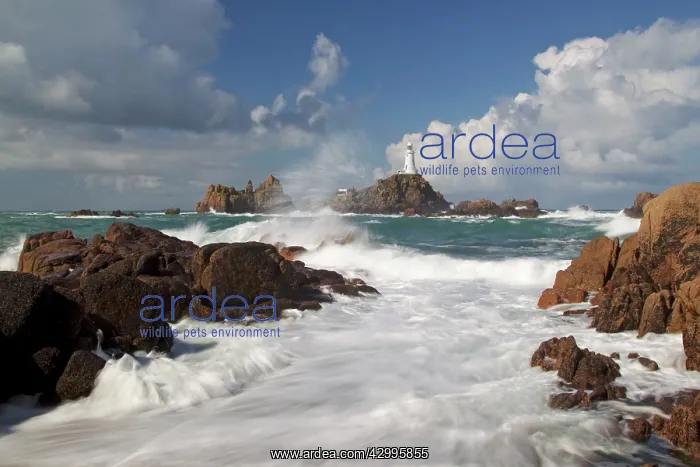 : Corbiere Lighthouse - showing tide over causeway : Corbiere Lighthouse - showing tide over causeway