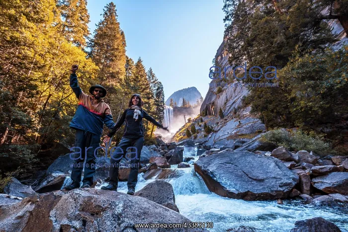 : A couple in Vernal Falls waterfall of Yosemite N : A couple in Vernal Falls waterfall of Yosemite N