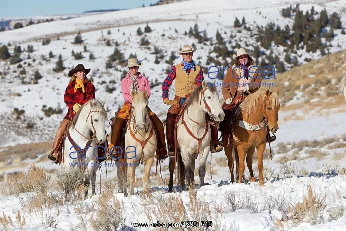: Cowboys / Cowgirls - family riding on Quarter Horses : Cowboys / Cowgirls - family riding on Quarter Horses