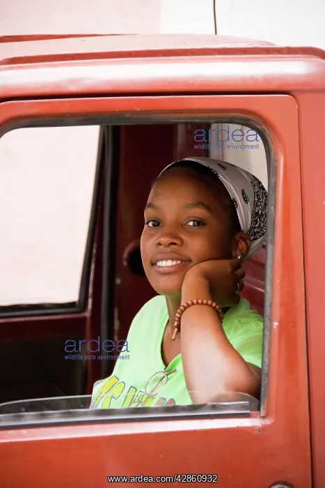 : Cuba - Young woman in a delivery van in Habana : Cuba - Young woman in a delivery van in Habana