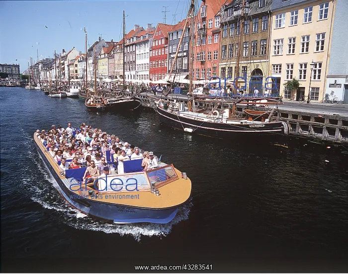 : Denmark, Cophenhagen - tourists on river boat : Denmark, Cophenhagen - tourists on river boat