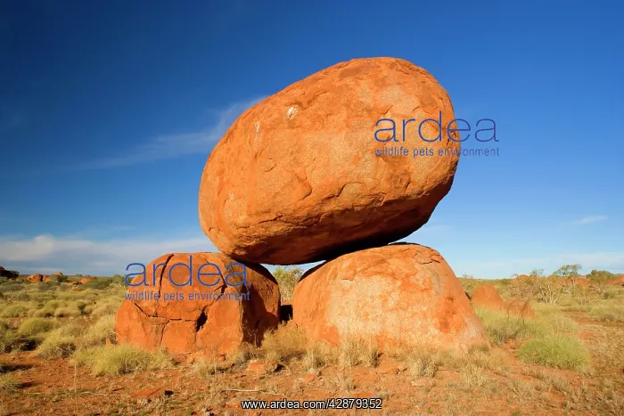 : Devils Marbles - a balanced rock of red granite : Devils Marbles - a balanced rock of red granite